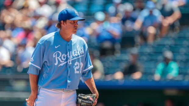 Jun 29, 2022; Kansas City, Missouri, USA; Kansas City Royals starting pitcher Zack Greinke (23) prepares to throw a pitch against the Texas Rangers during the first inning at Kauffman Stadium. Mandatory Credit: William Purnell-USA TODAY Sports